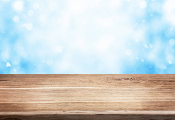 istock Winter or christmas background with empty wood table. 1417333362