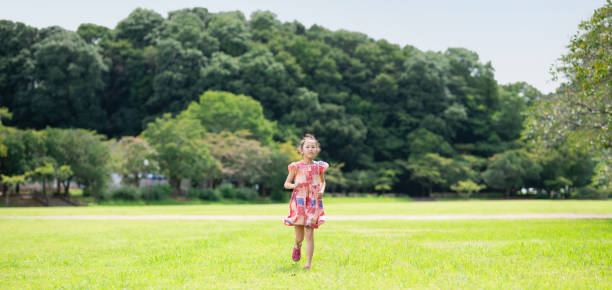 girl playing in the field