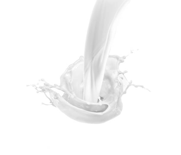 istock isolated milk drops and splashes on white background 1417338219