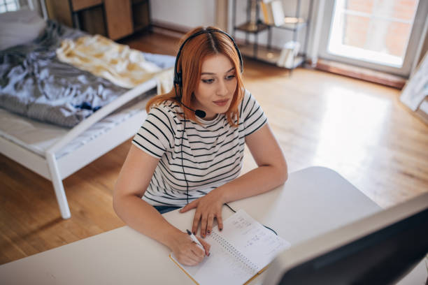 istock Woman having online course 1417344790
