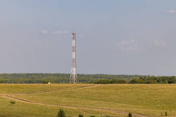 istock communication tower stands in a field in the countryside 1417348235