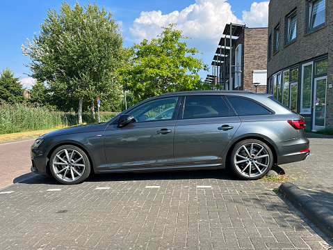 Almere, the Netherlands - August 23, 2022: Audi A4 Avant parked on public parking lot. Nobody in the vehicle.