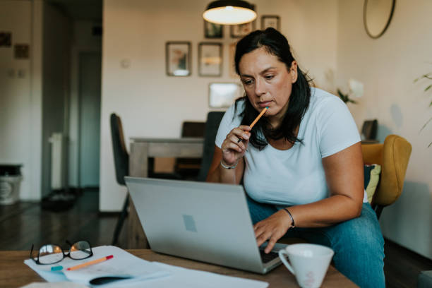 istock Adult woman learning at home 1417348423