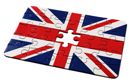 Jigsaw puzzle needs the final piece as a solution to a problem or challenge confronting Britain.
