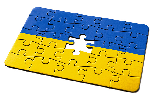 Jigsaw puzzle needs the final piece as a solution to a problem or challenge confronting the country.