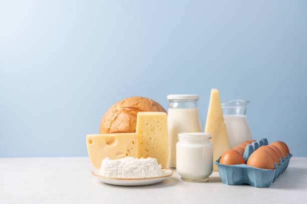 istock Variety of dairy products on blue background 1417358272