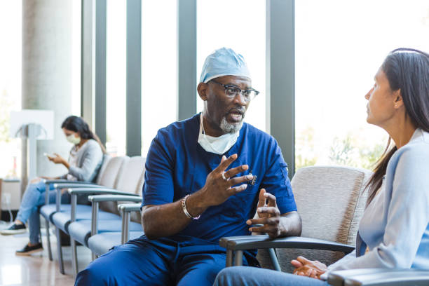 Doctor talks to the female patient