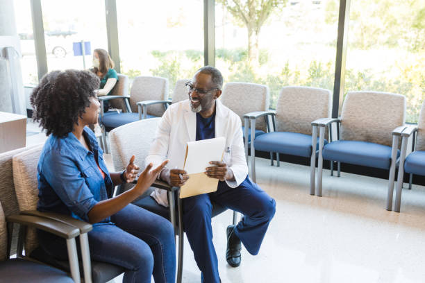istock Female patient explains her accomplishments after having surgery 1417359383