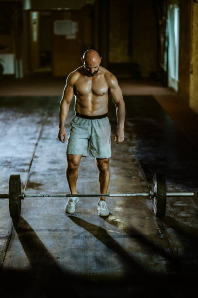 istock weightlifting strong man on a gym 1417360176
