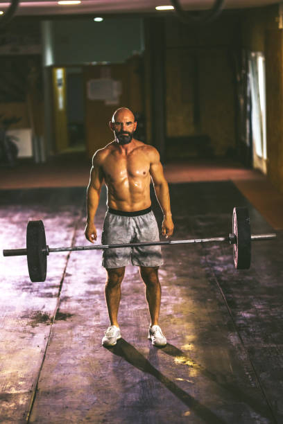 istock weightlifting strong man on a gym 1417360190