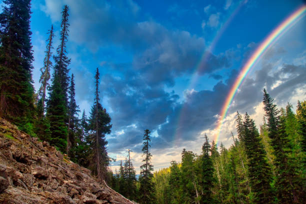 Rainbow in the Mountain Valley stock photo