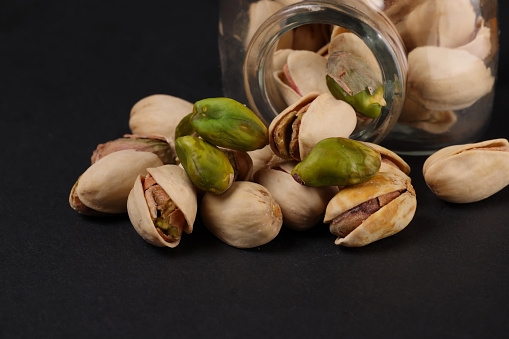 Pistachio nuts a member of the Cashew Family. High resolution image 45Mp taken with Canon EOS R5 and associate macro lens