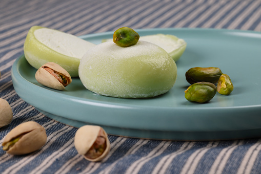 Pistachio Mochi a chilled refreshing ice cream. High resolution image 45Mp taken with Canon EOS R5 and associate macro lens