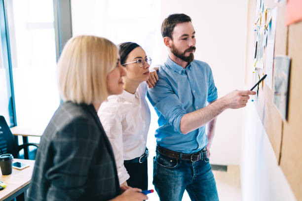 istock Business team listening to boss during collaboration work 1417379460