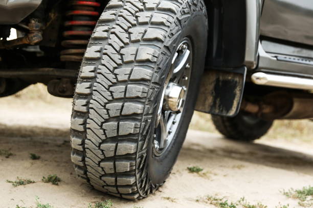 istock mud tire close up is on off road car. 1417385613