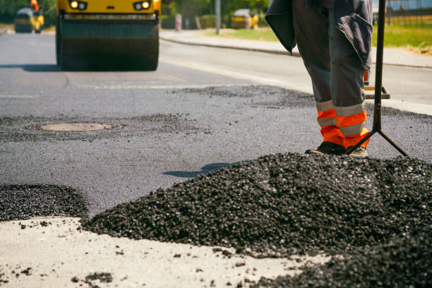 istock Laying new layer of asphalt 1417386771