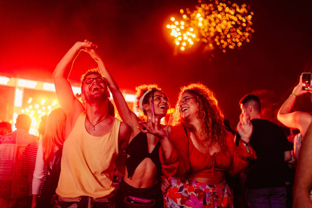 istock Excited people at summer festival 1417390334