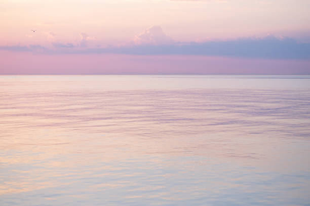 Blurred background sea and sky at sunrise.