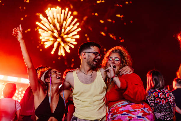 istock Young people dancing in summer festival 1417390634