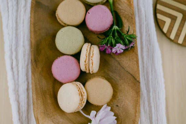 istock colorful macarons on a wooden plate 1417392379