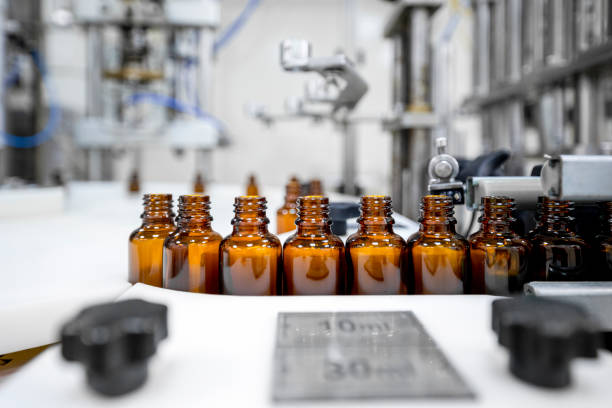 istock Pharmaceutical bottles seen arranged properly during the manufacturing in a pharmaceutical industry 1417394193