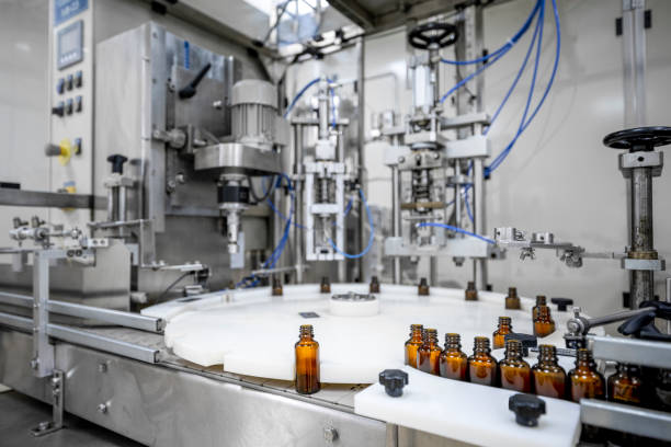 istock Pharmaceutical bottles seen arranged properly during the manufacturing in a pharmaceutical industry 1417394215