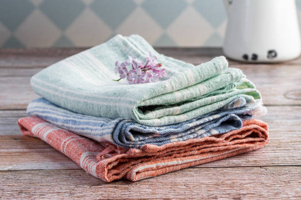 istock Linen towels on a wooden background 1417394623