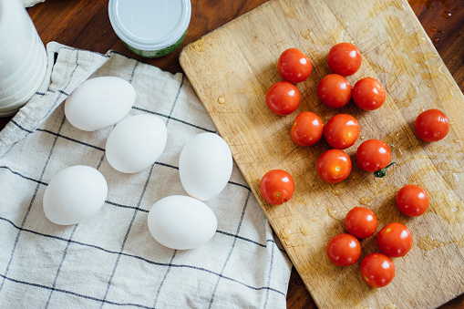 Ingredients for cooking: milk, eggs, tomatoes and cheese in Rome, Lazio, Italy