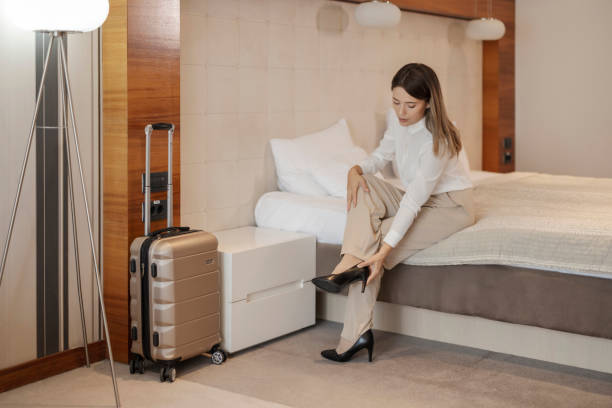 istock Businesswoman taking off her shoes 1417400819