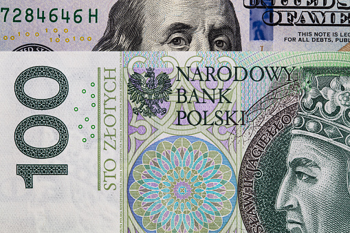 100 US  dollar and 100 polish zloty banknotes for design purpose