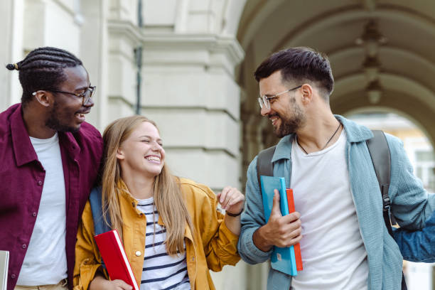 istock Group of student walking and talking 1417403326