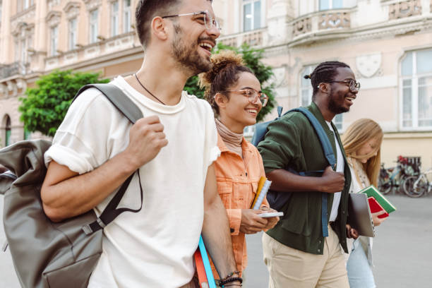 istock Group of international students having fun after class 1417403636