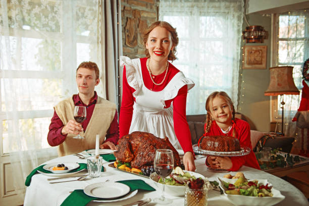 istock Family having a holiday dinner together, 50s retro style 1417404877