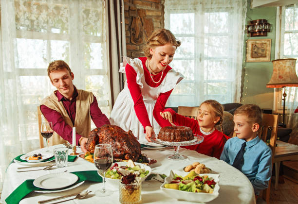 istock Family having a holiday dinner together, 50s retro style 1417404878