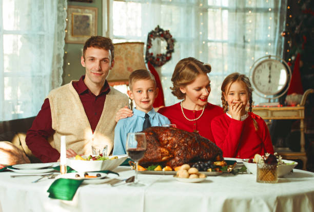 istock Family having a holiday dinner together, 50s retro style 1417404932