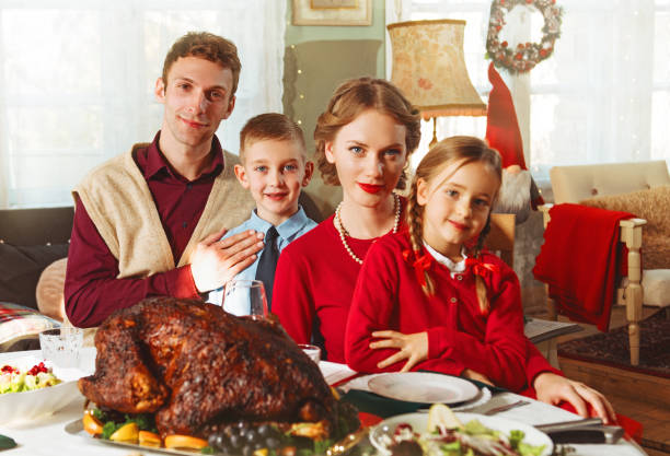 istock Family having a holiday dinner together, 50s retro style 1417404939
