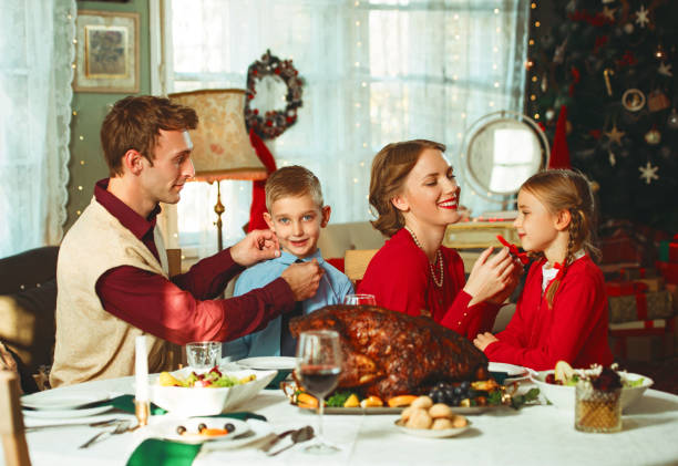 istock Family having a holiday dinner together, 50s retro style 1417404948