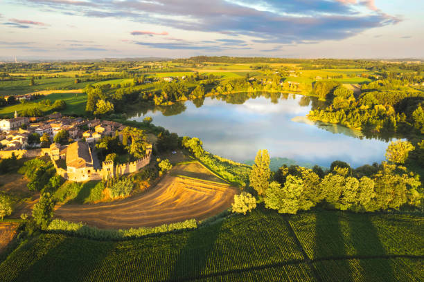 Aerial view of one of the best village of Italy with heart-shaped lake, Castellaro Lagusello, Mantova, Italy stock photo