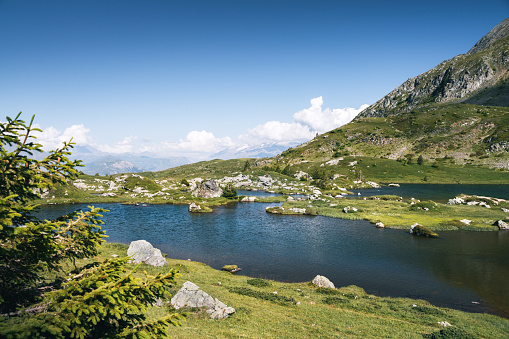 Stunning landscape of high altitude lake in the Oisans massif in the French Alps in summer