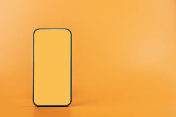 istock smartphone mockup,mobile phone blank screen frame on orange background 1417422320