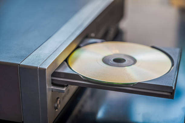 istock CD and VHS player. playing old CDs, old electrical and electronic devices, old-fashioned media player. 1417424156