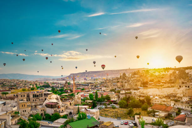 Goreme town in Cappadocia Goreme town in Cappadocia and bright morning sun nevsehir stock pictures, royalty-free photos & images