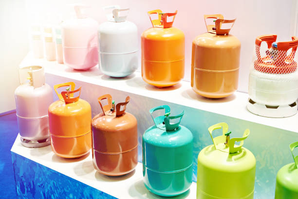 Metal refrigerant gas tanks in store Metal colored refrigerant gas tanks on display in a store refrigeration business air conditioner factory stock pictures, royalty-free photos & images