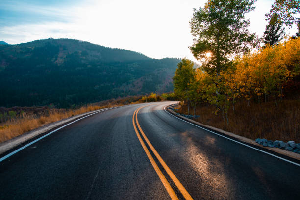 istock Bending road leading to a mountain 1417433599