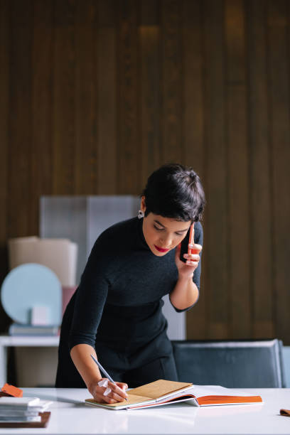 istock Female Entrepreneur Having A Phone Call 1417441849