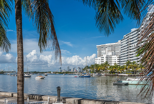 Miami Beach, Florida, USA - August 22, 2022: View of Downtown Miami skyline, Cruises Terminal, and surroundings from Miami Beach, Florida.