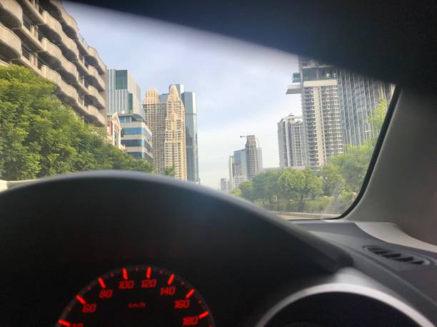 istock Modern city through window car 1417476360