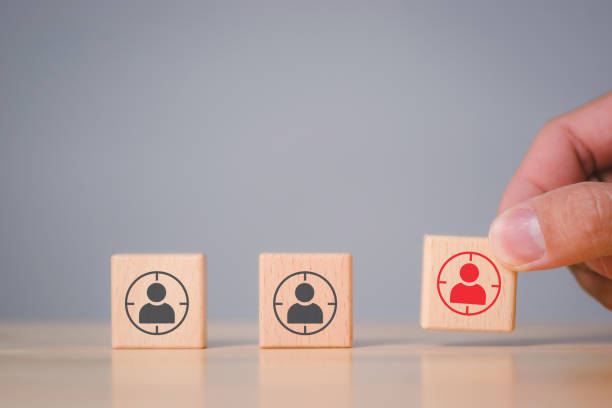 istock Hand holds wood cubes stacking with person data, Customer psychology profile or characteristics, Buyer personal and target customer concept. 1417477513