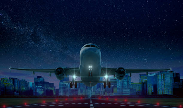 Commercial airplane Take off at night on airport runway with city in the background, 3D illustration. stock photo