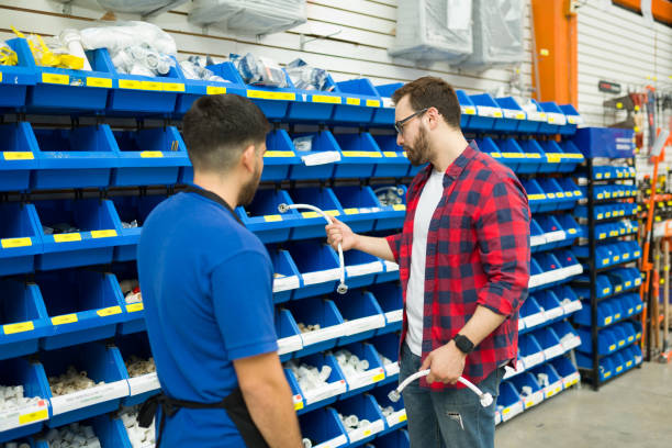 istock Construction male worker shopping for pipes 1417478893